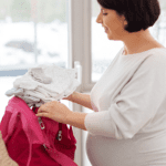 pregnant woman packing baby bag